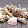 Drilled Seashells Assorted Mix (approx. 1 cup +/-15 shells 0.75-1.5+ inches) Drilled Shell Assortment for beach arts crafts décor & jewelry! Copyright 2025 SeaShellSupply.com.
