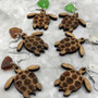 Wooden Sea Turtle Sea Glass Earrings (2 earrings approx. 1+ inches) Wood Sea Turtle Earrings Man Made Seaglass for beach fashion & gifts! Copyright 2026 SeaShellSupply.com