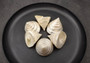 Polished Silver/Pearl Trochus Seashell (2-2.5 Inches) - Trochus Niloticus. One shiny bright spiral white shell with a wide opened base. Copyright 2024 SeaShellSupply.com.
