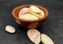 Sunrise Tellin Clam Seashells (10 pcs.) - Tellina Radiata. Multiple sherbert colored ribbed shells in a pile. Copyright 2025 SeaShellSupply.com.