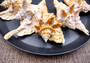 Rooster Conch Seashell (4-5 inches) - Strombus Gallus. White and tan shaded shell with multiple different spirals and shapes. Copyright 2024 SeaShellSupply.com.