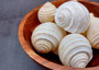 Costate Tun Seashell - Tonna Allium - (3 shells approx. 2-3 inches). Three tan and white ribbed shells facing three different directions showing all of the angles. Copyright 2024 SeaShellSupply.com.