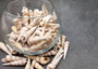 Purple Turitella Seashells - Turitella Communis - (approx. 25-30 shells 1-2 inches). Multiple stripped cone shaped shells in a pile. Copyright 2025 SeaShellSupply.com.