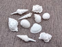White Seashell Medium Wedding Mix - (1 Kilogram/2.2 lbs. 100-120 shells approx. 1-2 inches).Multiple differently shaped and textured shells all bright white in a pile. Copyright 2022 SeaShellSupply.com.