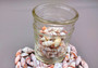 Assorted Miter Seashells (appx. 22-25 pcs.). Multiple red and orange shaded spiral ribbed shells in a pile. Copyright 2024 SeaShellSupply.com.
