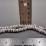 Tiger Puka Seashell Strand (1 strand approx. 15.5 inches x 4-5+ mm) Beautiful shell necklace neat for beach outfits or a classic gift!