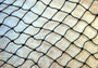 Decorative Fish Net Black Nylon Tied (1 net approx. 4x9 feet) Recycled Fishing net for ocean art projects crafts & nautical themed parties! Copyright 2026 SeaShellSupply.com.