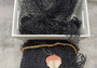 Fishing Net - Used (4 X 9 feet). One black tied fishing net that comes folded and banded. Copyright 2022 SeaShellSupply.com.
