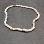 Tiger Puka Shell Necklace (16\" x 5-6mm). Two white shell necklaces. Copyright 2026 SeaShellSupply.com.