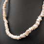 Tiger Puka Shell Necklace (16\" x 5-6mm). Two white shell necklaces. Copyright 2026 SeaShellSupply.com.