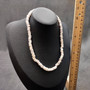 Tiger Puka Shell Necklace (16\" x 5-6mm). Two white shell necklaces. Copyright 2026 SeaShellSupply.com.