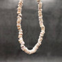 Tiger Puka Shell Necklace (16\" x 5-6mm). Two white shell necklaces. Copyright 2026 SeaShellSupply.com.