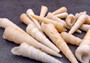 White/Tan Turitella Seashells (10 pcs.) - (appx. 2.5 Inches+) - Turitella Terebra. Multiple white spiral shells laid together.Copyright 2024 SeaShellSupply.com.