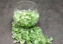 Beach Glass - Crushed & Tumbled Small Light Green Pebbles - (approx. 1 Kilogram/2.2 lbs. .25-1 inches). Multiple different colored crushed pebbles in a pile. Copyright 2025 SeaShellSupply.com.