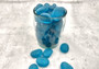 Beach Glass - Rounded Aqua Blue Pebbles - (approx. 1 Kilogram/2.2 lbs. 1-1.5 inches). Multiple smooth blue glass pebbles in a pile. Copyright 2025 SeaShellSupply.com.