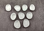 Beach Glass - Rounded Clear-White Frosted Pebbles - (approx. 1 Kilogram/2.2 lbs. 1-1.5 inches). Multiple lightly colored shells in a pile. Copyright 2025 SeaShellSupply.com.