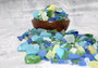 Beach Glass - Medium Tumbled Rough Blue, Green & White Atlantic Assorted - (approx. 1 Kilogram/2.2 lbs. .5-1.25 inches). Multiple different shapes and sizes pieces all in a pile. Copyright 2025 SeaShellSupply.com.