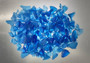 Beach Glass - Medium Tumbled Rough Cobalt Blue - (approx. 1 Kilogram/2.2 lbs. .5-1.25 inches). Multiple shaded blue tiles in a pile, all are different sizes and shapes. Copyright 2025 SeaShellSupply.com.