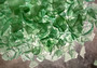 Beach Glass - Medium Tumbled Rough Coke Bottle Green - (approx. 1 Kilogram/2.2 lbs. .5-1.25 inches). Multiple green glass pieces in different shapes. Copyright 2025 SeaShellSupply.com.