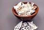 Cerithium Sliced/Center Cut Seashells (10 pcs.). White ribbed shells showing the inner cavities. Copyright 2024 SeaShellSupply.com.