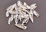 Cerithium Sliced/Center Cut Seashells (10 pcs.). White ribbed shells showing the inner cavities. Copyright 2024 SeaShellSupply.com.