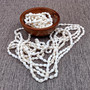 White Nassa Shell Leis (3 Leis Approx. .25 x 28 Inches). White little shells strung through string. Copyright 2026 SeaShellSupply.com.