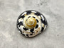 Polished West Indian Top/Magpie Seashell - Cittarium Pica - (1 shell 2-2.5 inches). Black and white spotted spiral shell with cute little opening. Copyright 2025 SeaShellSupply.com.