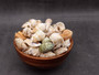 Medium Seashell Assorted Ocean Mix - (Approx 2.2 pounds, Approx. 1 - 2.25 inches). A bunch of tan little shells with wide open backs. Copyright 2025 SeaShellSupply.com.