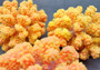 Yellow Faux Coral Cluster - Pocillopora Elegans - (1 FAUX Coral approx. 5Wx3Dx4T). Orange and pink tinted fluffy heavily textured coral cluster with many arms. Copyright 2024 SeaShellSupply.c