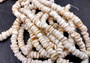White Puka Seashell Strand (1 strand approx. 16 inches x 4-5+ mm) Beautiful shell strand perfect for a classic gift! Long necklace section of stacked puka shells. Copyright 2024 SeaShellSupply.com