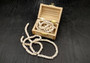 White Puka Seashell Strand (1 strand approx. 16 inches x 4-5+ mm) Beautiful shell strand perfect for a classic gift! Long necklace section of stacked puka shells. Copyright 2024 SeaShellSupply.com