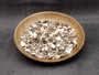 Extra Small Drilled Seashells (approx. 1 cup 180+ shells 0.5+ inch) Perfect shells for coastal crafting and collections! Mixed pastel spiral and wide shells of tan and brown colors with a sprinkle of purple. Copy right 2025 SeaShellSupply.com