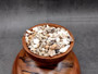 Extra Small Drilled Seashells (approx. 1 cup 180+ shells 0.5+ inch) Perfect shells for coastal crafting and collections! Mixed pastel spiral and wide shells of tan and brown colors with a sprinkle of purple. Copy right 2025 SeaShellSupply.com