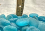 Beach Sea Glass Rounded Turquoise Blue Frosted Tumbled Pebbles (approx. 1 Kilogram or 2.2 lbs. 1-1.5 inch). Pile of blue turquoise Beach Glass pebbles. Copyright 2025 SeaShellSupply.com.