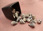 Small Hebrew Cone Seashells - Conus Ebraeus - (5 shells approx. .75-1 inches) White shells with black spots in a pile. Copyright 2025 SeaShellSupply.com.