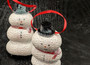 Sea Urchin Snowman Ornament (1 urchin snowman approx. 3-4 inches) on green background. Copyright 2024 SeaShellSupply.com.