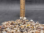Ocean Mix Tiny Seashells (approx. 750-800 shells .25-.625 inches). Multiple colored shells with different patterns in an intricate pile. Copyright 2025 SeaShellSupply.com.
