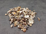 Ocean Mix Tiny Seashells (approx. 750-800 shells .25-.625 inches). Multiple colored shells with different patterns in an intricate pile. Copyright 2025 SeaShellSupply.com.