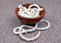 White Puka Style Seashells Drilled Strand (1 strand approx. 16 inches x 4-5+ mm) Copyright 2024 SeaShellSupply.com