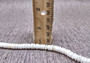 White Puka Style Seashells Drilled Strand (1 strand approx. 16 inches x 4-5+ mm) Copyright 2024 SeaShellSupply.com