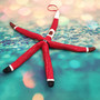 Red Linckia Starfish Black Santa Claus Ornament (1 star approx. 10-11+ inches) Painted Black Santa Claus Starfish Ornament For Christmas  Copyright 2025 SeaShellSupply.com.