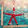 Red Linckia Starfish Black Santa Claus Ornament (1 star approx. 10-11+ inches) Painted Black Santa Claus Starfish Ornament For Christmas  Copyright 2025 SeaShellSupply.com.