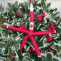Red Linckia Starfish Black Santa Claus Ornament (1 star approx. 10-11+ inches) Painted Black Santa Claus Starfish Ornament For Christmas  Copyright 2025 SeaShellSupply.com.