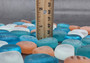 Beach Glass - Rounded Blue, Peach & White Assorted Pebbles - (approx. 1 Kilogram/2.2 lbs. 1-1.5 inches). Multiple colored pebbles in a pile. Copyright 2022 SeaShellSupply.com.