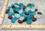 Beach Glass - Rounded Blue, Purple & White Assorted Pebbles - (approx. 1 Kilogram/2.2 lbs. 1-1.5 inches). Multiple colored pebbles in a pile. Copyright 2022 SeaShellSupply.com.