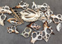 Large Assorted Center Cut Seashells (5 shells approx. 1.5-3 inches). Multiple sheets of shell with the inner cavities intact. Copyright 2022 SeaShellSupply.com.
