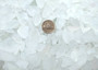 Beach Glass - Small Tumbled Rough Frosty White - (approx. 1 Kilogram/2.2 lbs. .25-1 inches). Multiple stone pebbles in a pile. Copyright 2025 SeaShellSupply.com.