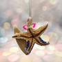 Surfing Santa Starfish Ornament (1 seastar approx. 5+ inches) Real Festive Starfish Xmas Hanging Ornament! Copyright 2025 SeaShellSupply.com