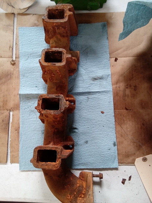 Mahindra 6520 000021857E14 exhaust manifold