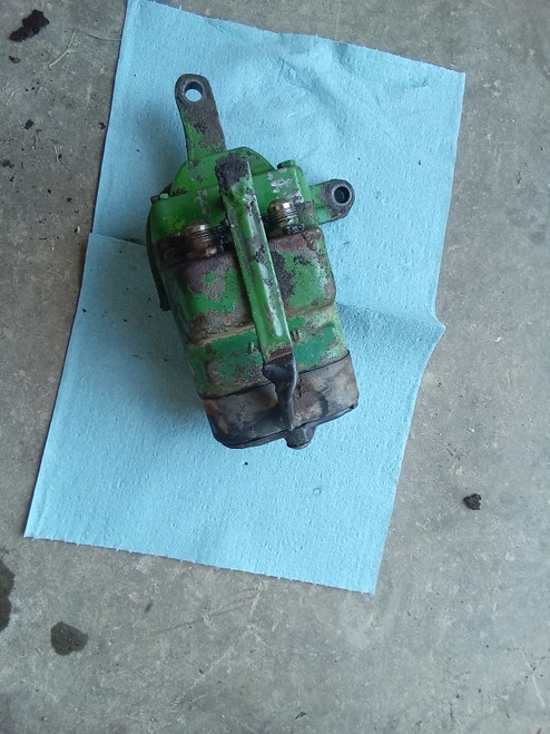 John Deere  RE22586 marked as R73117 breakaway Coupler Assembly 